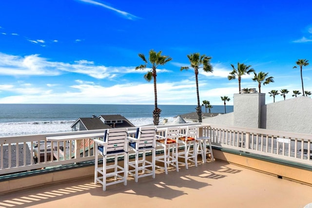 view of patio featuring a water view