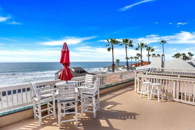 view of patio / terrace with a water view