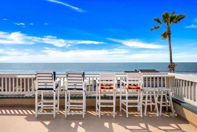 view of patio / terrace featuring a water view
