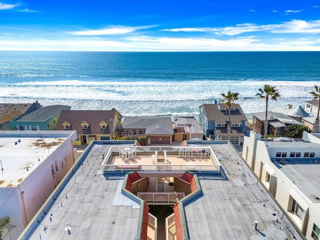 aerial view featuring a beach view and a water view