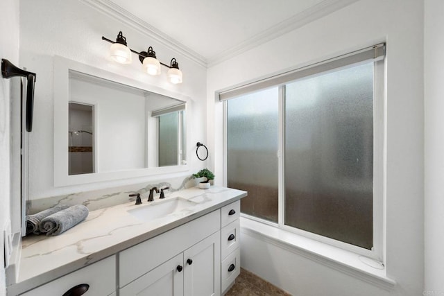 full bath featuring ornamental molding and vanity