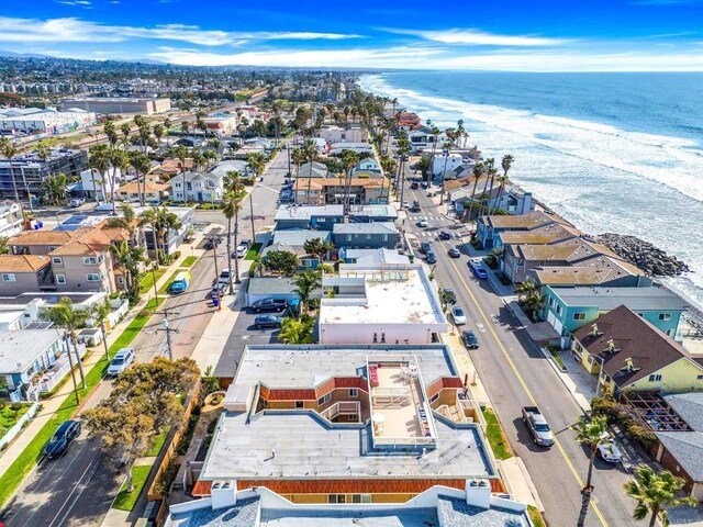 aerial view with a residential view and a water view
