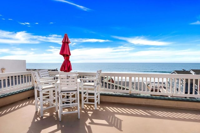 exterior space with a water view