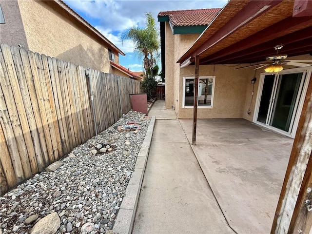 view of patio / terrace with ceiling fan and a fenced backyard