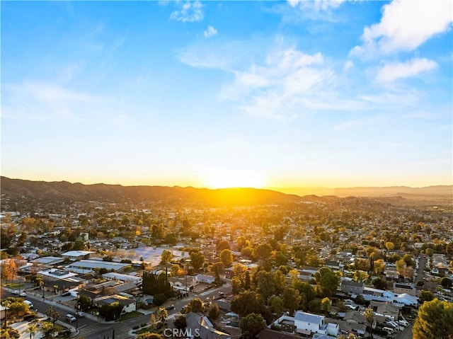 birds eye view of property with a residential view and a mountain view