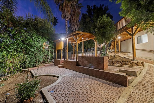 view of patio at night