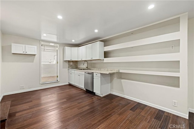 kitchen featuring open shelves, a sink, dark wood finished floors, and white cabinets