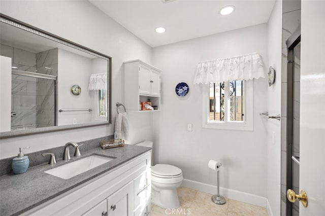 full bath featuring toilet, recessed lighting, vanity, baseboards, and a stall shower