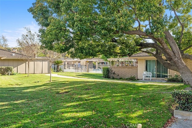 view of yard with fence