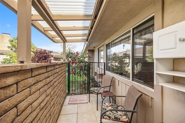 balcony featuring a sunroom