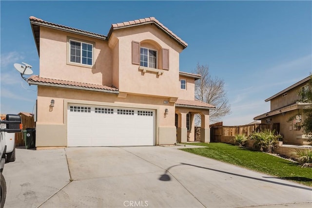 mediterranean / spanish house featuring an attached garage, fence, a tile roof, concrete driveway, and stucco siding