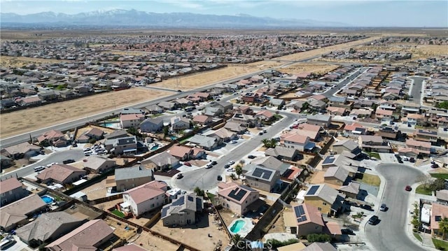 bird's eye view featuring a residential view and a mountain view