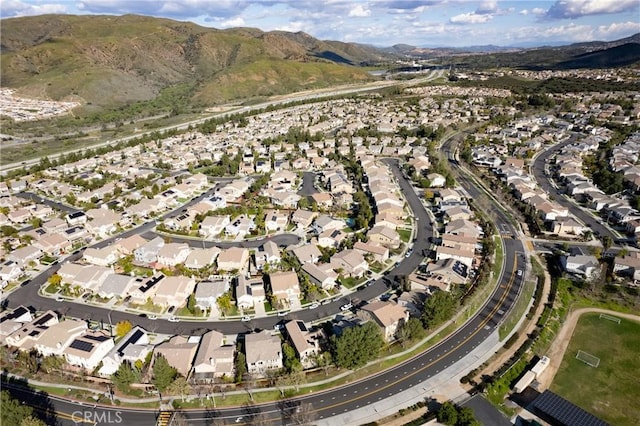 birds eye view of property with a residential view and a mountain view