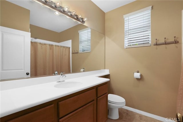 full bathroom with baseboards, toilet, a shower with curtain, tile patterned flooring, and vanity