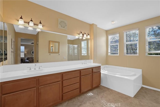 full bathroom featuring double vanity, a sink, a bath, and a shower stall