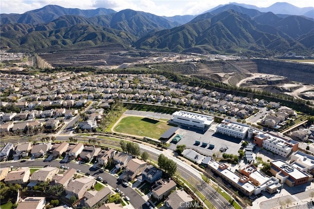 bird's eye view featuring a residential view and a mountain view