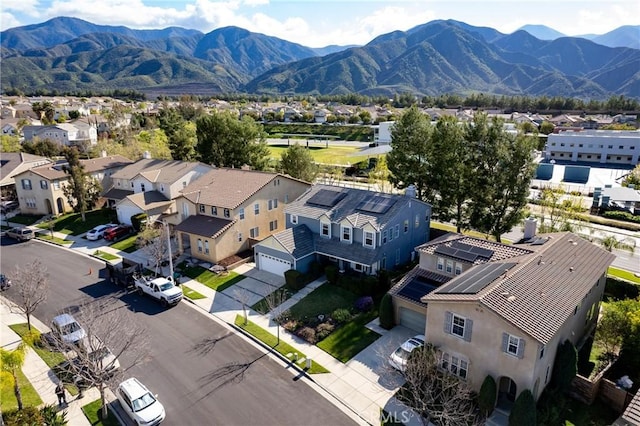 bird's eye view featuring a mountain view and a residential view