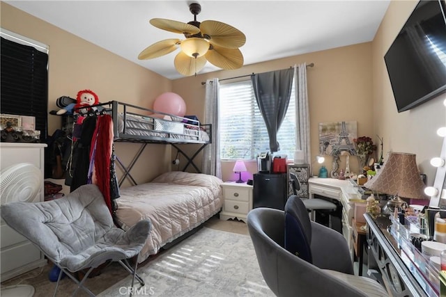 bedroom featuring ceiling fan