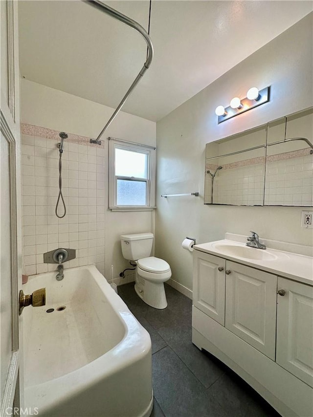 full bathroom with tile patterned flooring, toilet, vanity, baseboards, and  shower combination