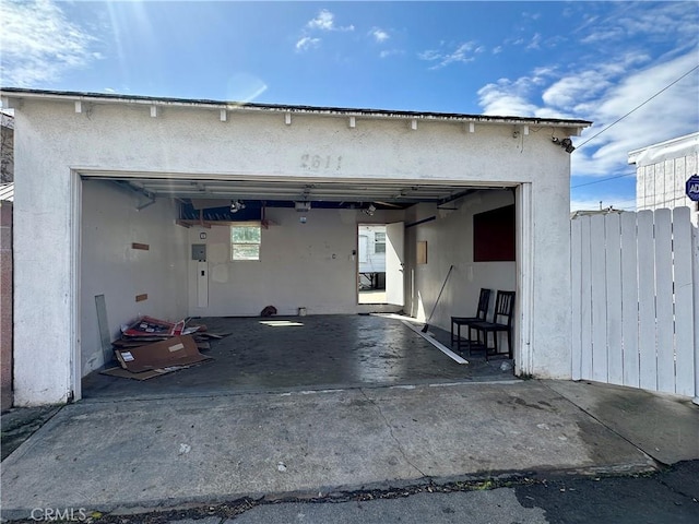 garage with fence