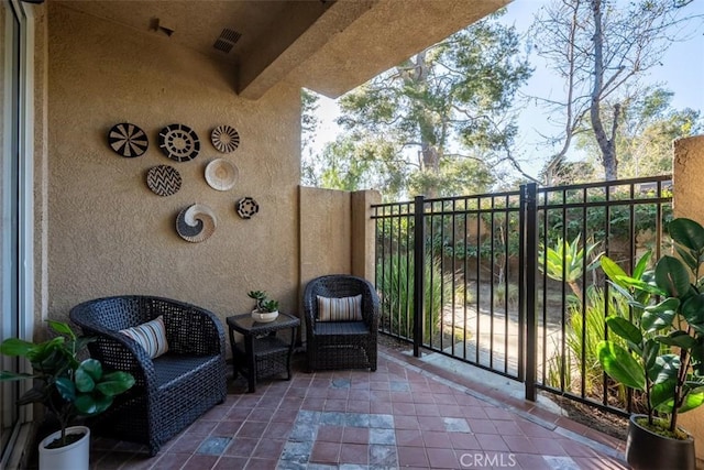 balcony featuring visible vents