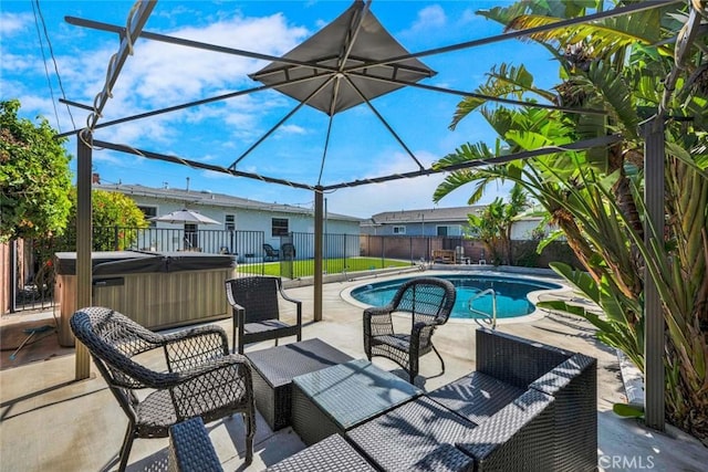 view of swimming pool with a lanai, a fenced backyard, a fenced in pool, a patio area, and a hot tub