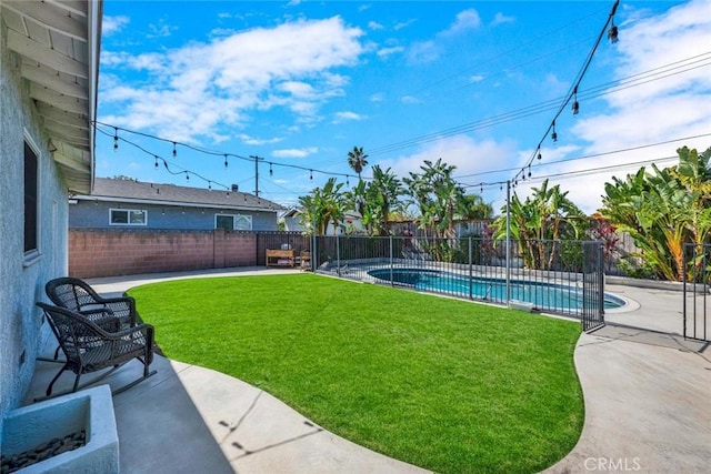 view of yard with a patio, a fenced backyard, and a fenced in pool