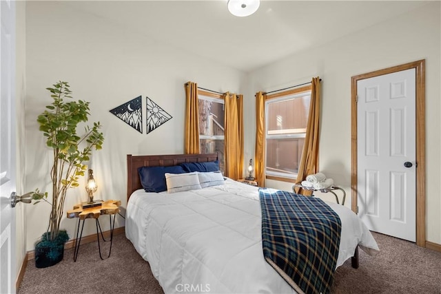 carpeted bedroom with baseboards