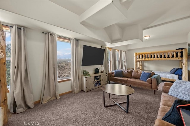 living room with baseboards and light colored carpet