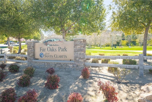 view of community with fence