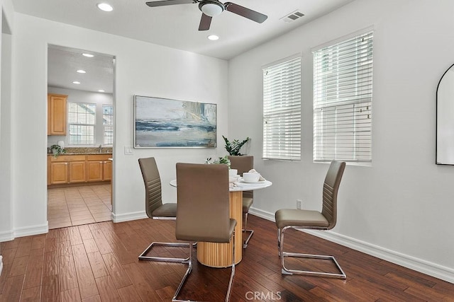 dining area featuring recessed lighting, visible vents, baseboards, and hardwood / wood-style flooring