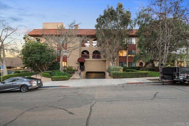 view of building exterior with a garage