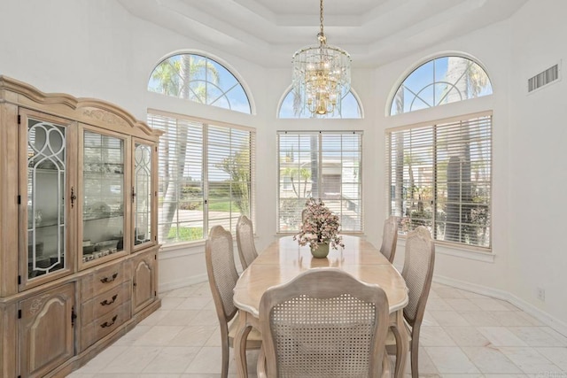 1367 Corona, Bonita, CA 91902 - dining area with plenty of natural light, a chandelier, a raised ceiling, and a high ceiling