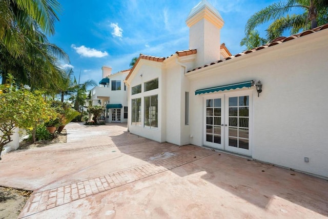 1367 Corona, Bonita, CA 91902 - rear view of property with french doors, a patio, stucco siding, and a tile roof