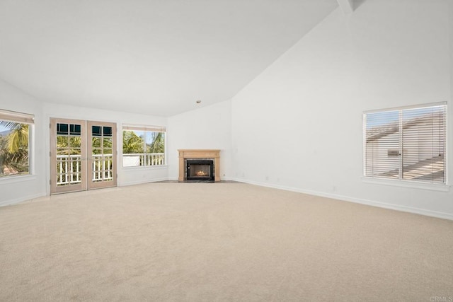 1367 Corona, Bonita, CA 91902 - unfurnished living room featuring light carpet, high vaulted ceiling, and a fireplace with flush hearth