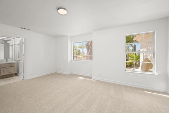 1367 Corona, Bonita, CA 91902 - unfurnished bedroom with light colored carpet and ensuite bathroom