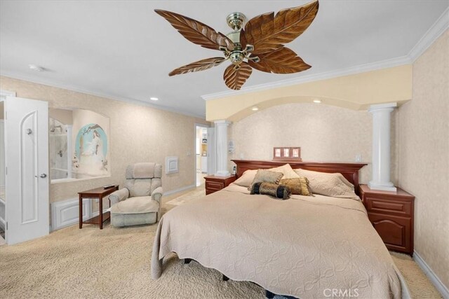 carpeted bedroom featuring baseboards, ornamental molding, ornate columns, and ceiling fan
