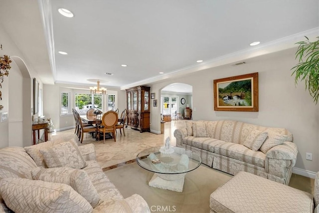 living room with visible vents, arched walkways, baseboards, and recessed lighting