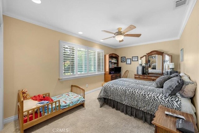 carpeted bedroom featuring crown molding, baseboards, recessed lighting, and visible vents