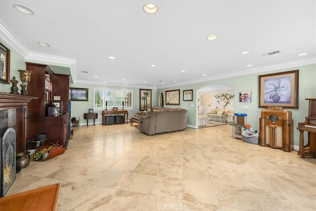 living room featuring visible vents, arched walkways, and recessed lighting