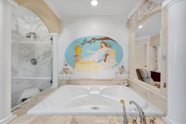 bathroom featuring ornate columns, ornamental molding, a tub with jets, and a shower stall