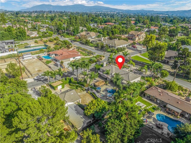 aerial view with a mountain view and a residential view