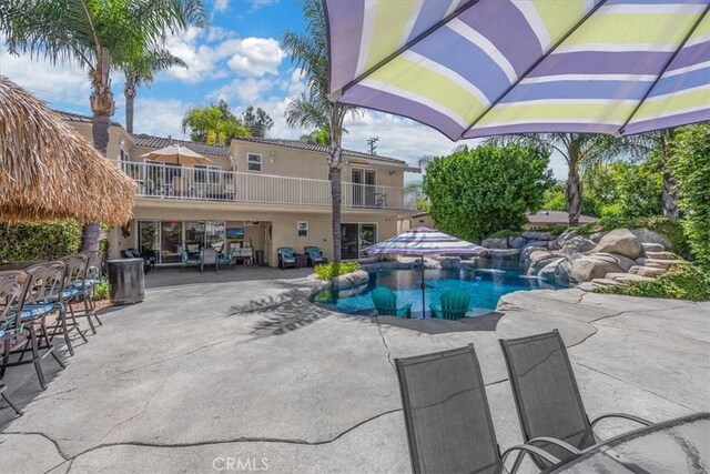 outdoor pool featuring a patio