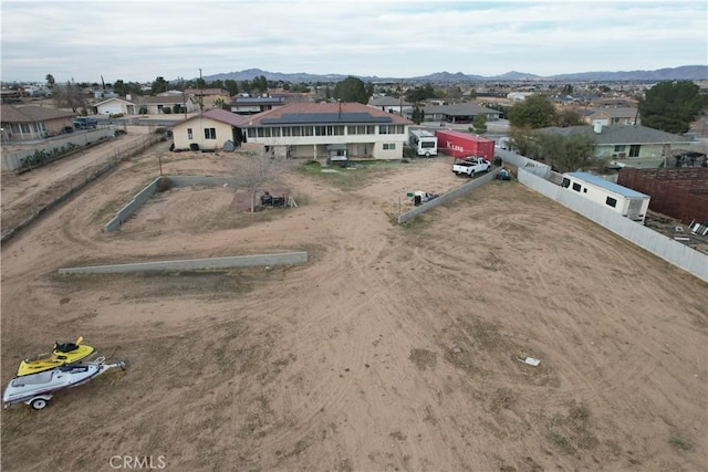 birds eye view of property with a residential view and a mountain view