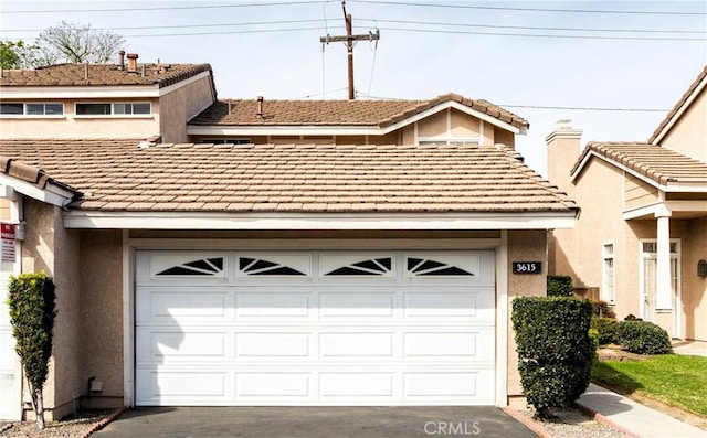 garage with driveway