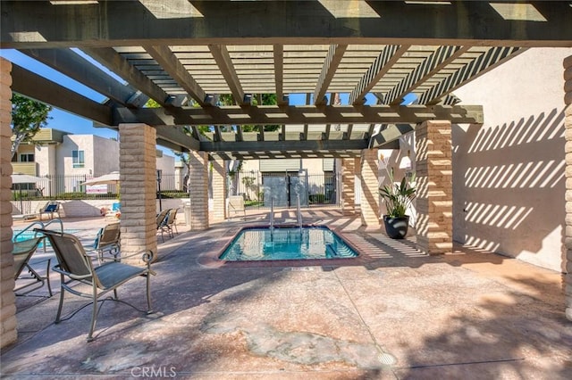 view of pool featuring a pergola, fence, a swimming pool, and a patio