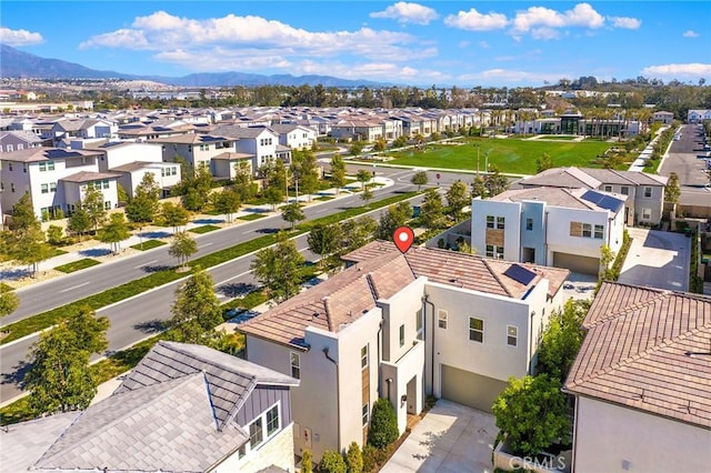 bird's eye view featuring a mountain view and a residential view