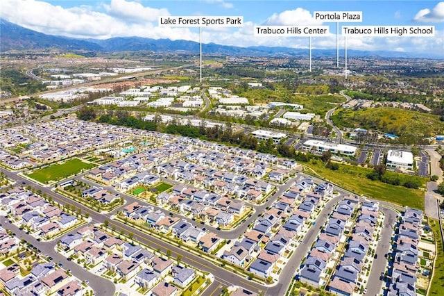 aerial view with a residential view and a mountain view