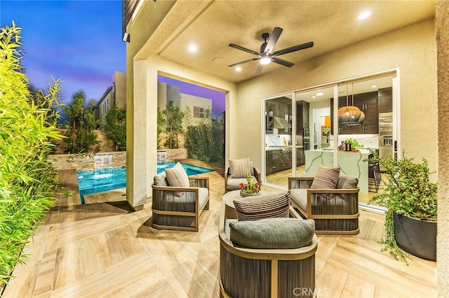 view of patio / terrace with an outdoor pool, ceiling fan, and an outdoor living space