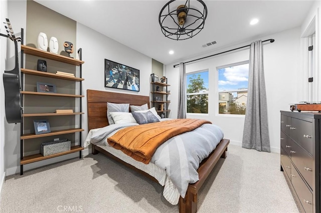 bedroom featuring baseboards, recessed lighting, visible vents, and light colored carpet